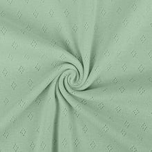 Load image into Gallery viewer, Sea green pointelle knit jersey fabric from Once Upon A Fabric with diamond-shaped perforations. The pointelle cotton jersey fabric appears lightweight, suggesting it may be perfect for baby clothes or accessories.
