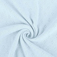 Load image into Gallery viewer, Baby blue pointelle knit jersey fabric from Once Upon A Fabric with diamond-shaped perforations. The pointelle cotton jersey fabric appears lightweight, suggesting it may be perfect for baby clothes or accessories.
