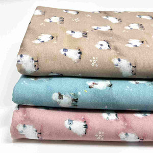 sheep jersey fabric on beige blue and pink background