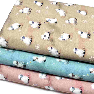 sheep jersey fabric on beige blue and pink background
