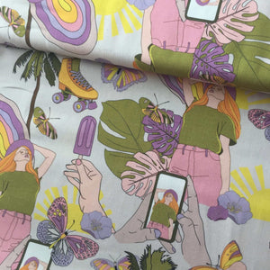 A colorful fabric, perfect for home furnishing, featuring illustrations of a woman with red hair, green top, and pink pants. Made from 100% cotton, the design includes elements like ice cream, roller skates, butterflies, tropical leaves, and phones showing the woman's image—ideal for vibrant upholstery projects. Introducing the **97 cm REMNANT 100% Premium Cotton - Retro Summer** by **Once Upon A Fabric**.